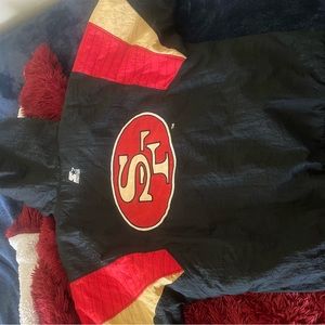 Vintage 90s 49ers black jacket.